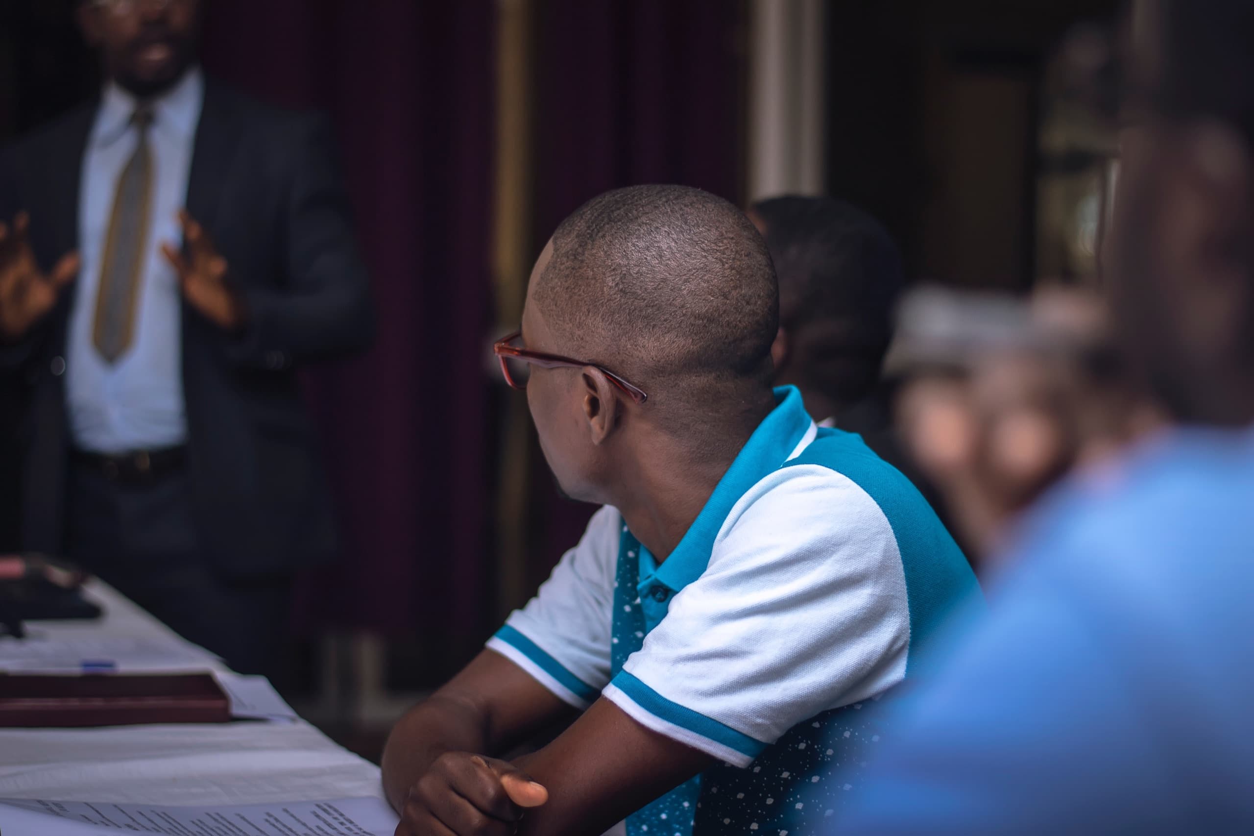 A lecturer teaching a class of university students